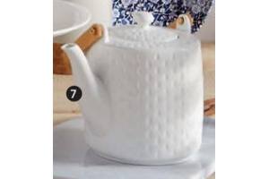 theepot met houten handvat