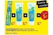 oral b tandenborstel en twee tubes tandpasta