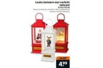 leuke lantaarn met verlicht tafereel