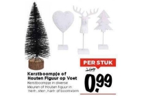 kerstboompje of houten figuur op voet