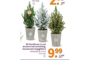 ah kerstboom in pot versierd met verlichting besneeuwd of geglitterd